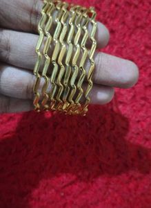 Elegant Gold Tone Zigzag Bangles