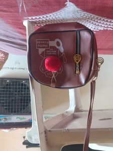Sling  Bag with Pom Po