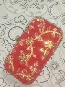 Red clutch unused