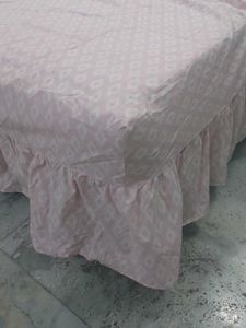 Pink Diamond Pattern Bedspread with frill.