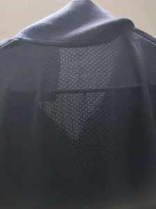 Uniqlo Men's Navy Blue Polo Shirt
