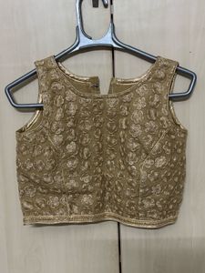Golden Embroidered Sleeveless Blouse