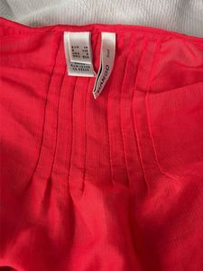 Red Sleeveless Blouse with Ruffle Sleeves