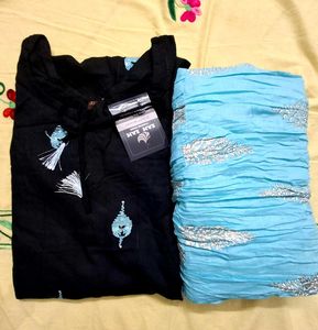 sky blue flared maxi skirt styled as part of a tra