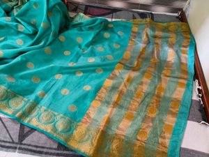 Elegant Teal Saree with Gold Border