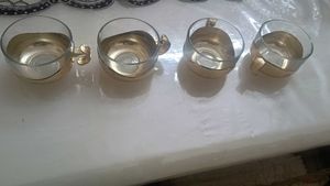 Four golden Glass cups