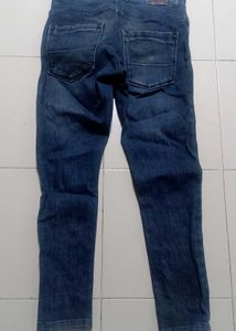 Distressed Blue Denim Jeans