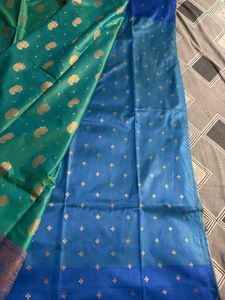 Elegant Teal Saree with Gold Paisley