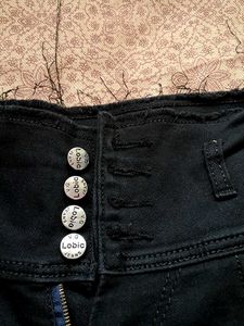 High-Waisted Button Front Jeans