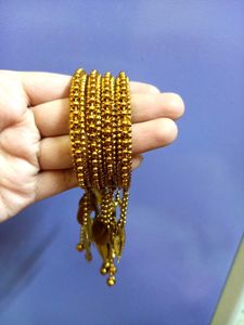 Golden Bangles with charms