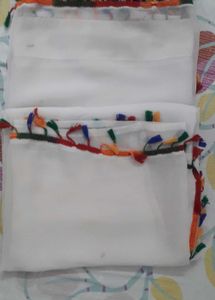 White Saree with multi coloured boarder