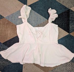 white frill sleeveless top