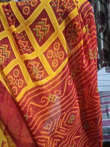 red and yellow saree