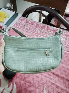 20.Stylish Croc-Embossed Shoulder Bag