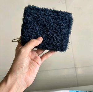 dark blue faux fur and embroidered cat feature