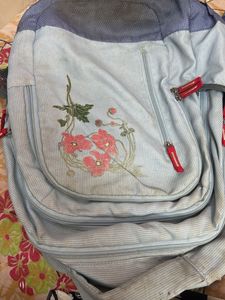 Light Blue Skybag Backpack with Floral Design