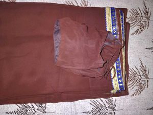 Elegant Brown Saree with Intricate Border