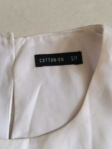 Chic White Sleeveless Blouse