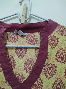 Ruhaans Yellow Kurta With Maroon Prints And Trim