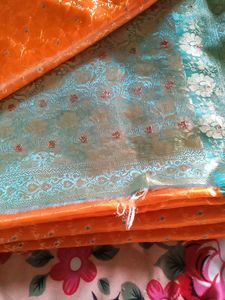 Vibrant Orange Saree with Blue &amp; Silver Border