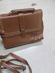 woman sling bag cara brand