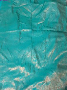 Elegant Teal Saree with Intricate Weave