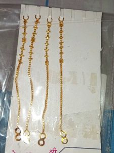 Elegant Golden earrings hold Chain