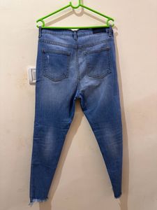 Mid Waist Blue Jeans