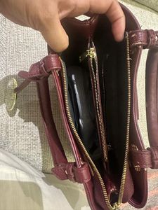 BVLGARI Chic Maroon Handbag with Snake Charm