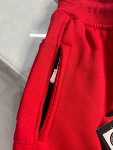 RED CONVERSE LOWER WITH SIDE POCKET