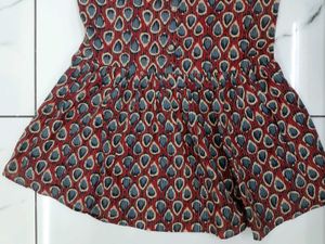 Maroon printed sleeveless short kurti
