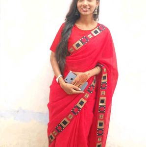 Vibrant Red Saree with Geometric Border