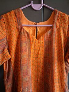Vibrant Orange Printed Kurta Set