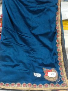 Elegant Teal Saree with Embellished Border