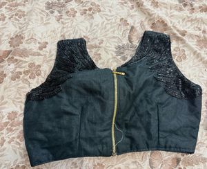 Embellished Padded Sleeveless Blouse