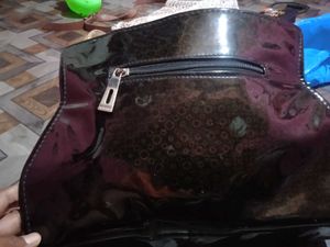 Chic Black Patent Handbag with Gold Chain