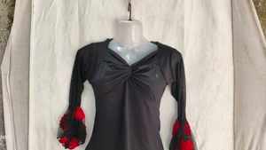 I. Stylish Black Top with Bell Sleeves