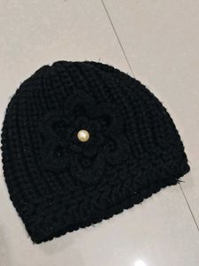 Chic Black Knit Beanie with Pearl Accent