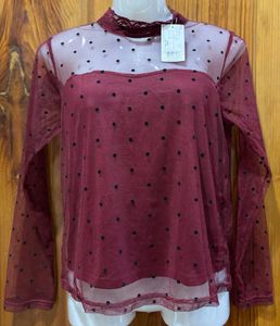 Polka dotted sheer top