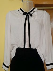 Classic White Blouse with Black Accents
