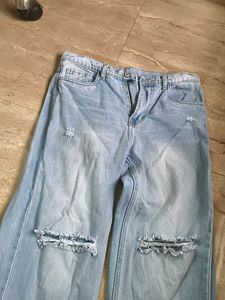 Light Wash Ripped Jeans (never worn)