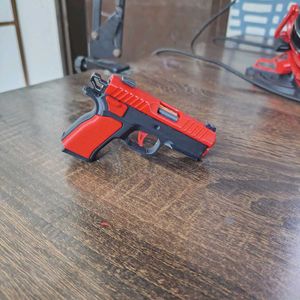 Toy Gun keychain  with blow back action- Red and B