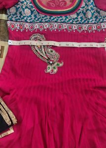 red suit with  black churidar and dupatta