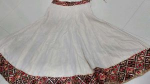Elegant White Lehenga with Embellished Border