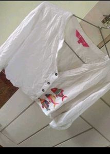 White Jeans and Embroidered Shirt