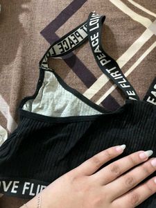 Trendy Black Ribbed Bra with Statement Straps