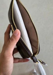 New Coach wristlet with dustbag