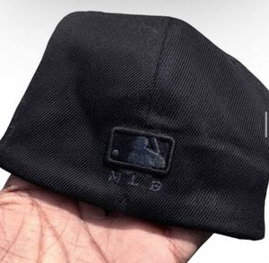 Black Baseball Cap with 'D' Logo