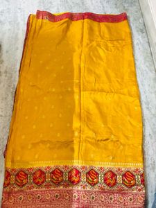 Vibrant Yellow Silk Saree with Intricate Weave