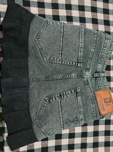 Stylish Denim Skirt with Pleated Hem